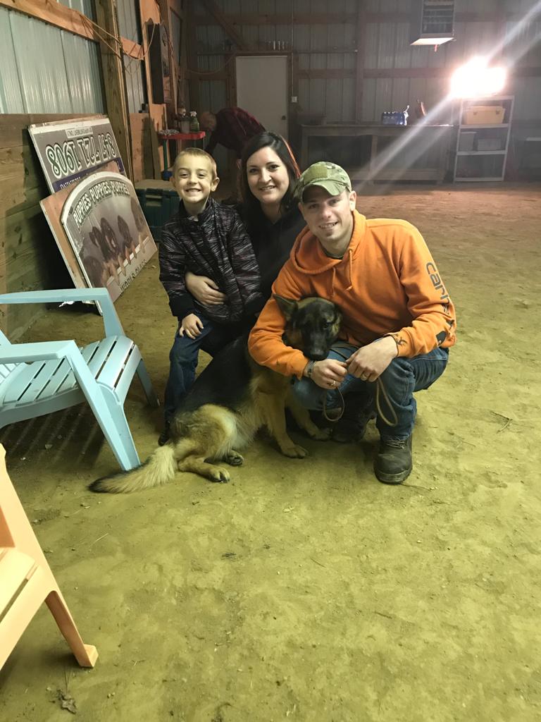 Family with service dog